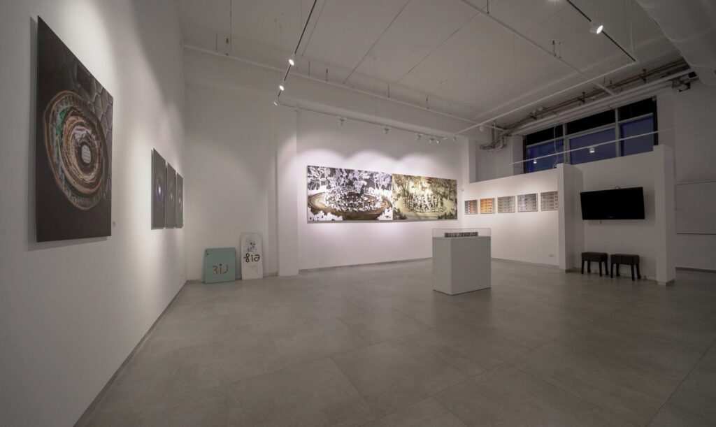Professional lighting design in a modern art gallery in Modiin with adjustable track lighting enhancing artworks